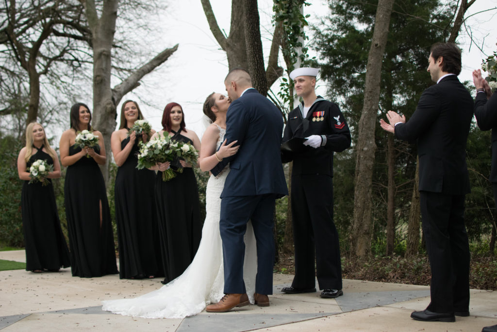 Wedding officiant and first kiss during the ceremony