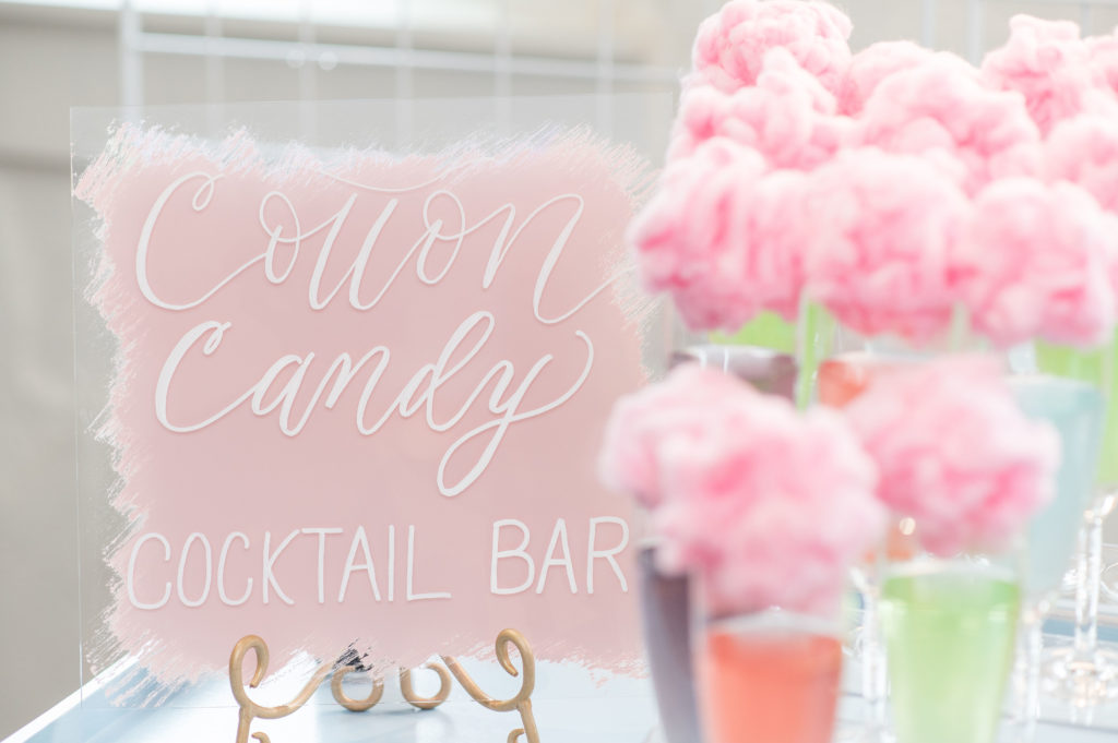 Pastel cotton candy cocktail bar pink sign and cotton candy cocktails 