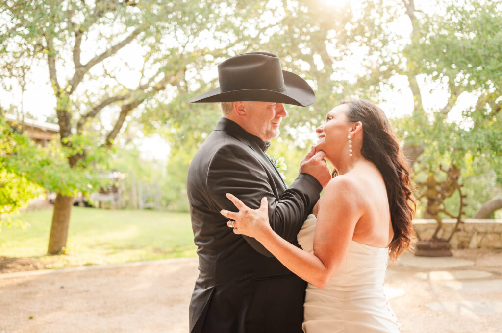 Bride and Groom look into each others eyes after their ceremony at Camp Lucy Dripping Springs Wedding